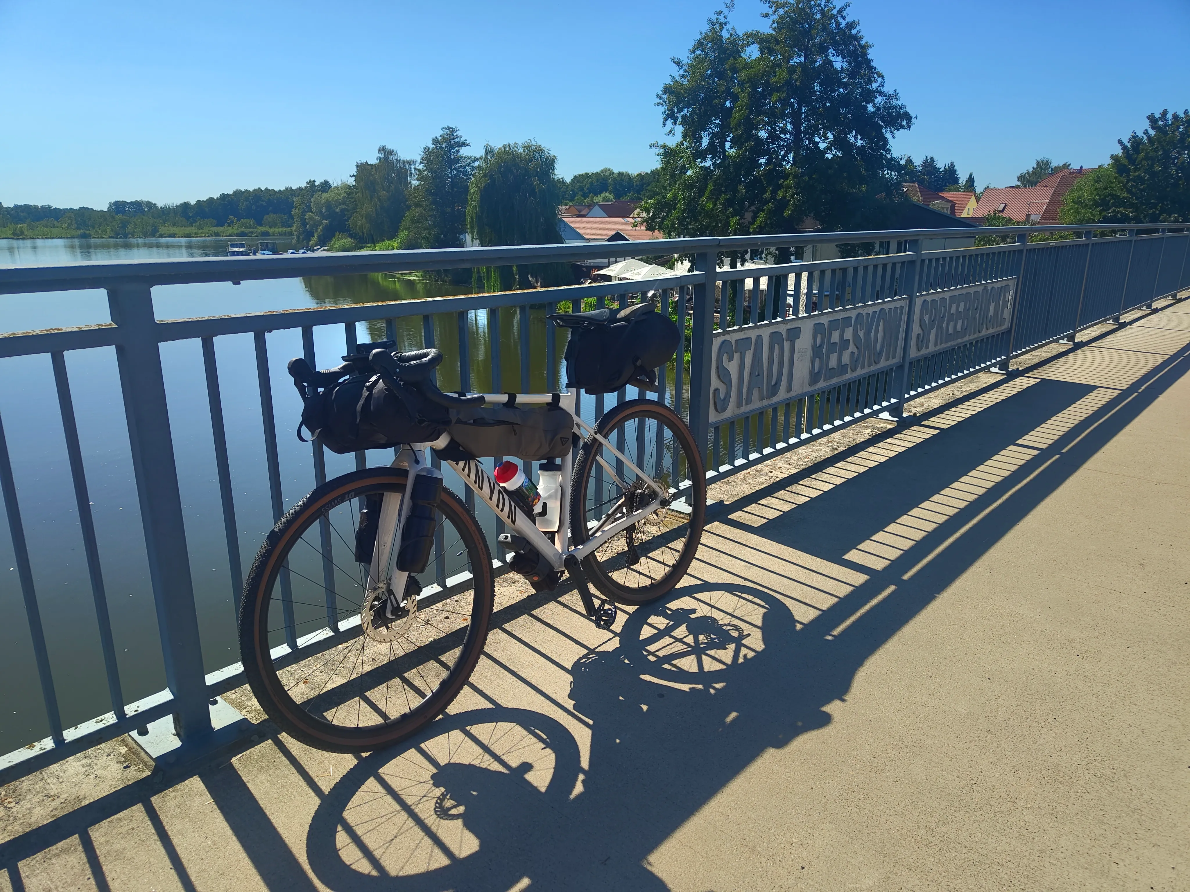 Bicycle leaning on a bridge above the Spree river